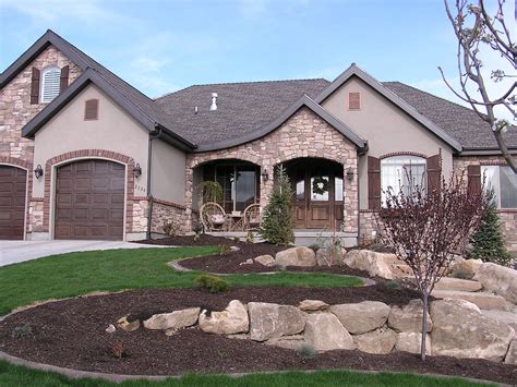 metal roof with pink stucco house|3 story stucco house exterior.